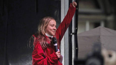 Greta Thunberg salutes after giving a speech in Glasgow, Scotland, November 5, 2021