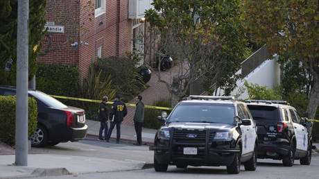 FBI agents are seen outside the home of House Speaker Nancy Pelosi and her husband Paul Pelosi in San Francisco, California, October 28, 2022.