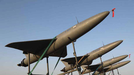 Iranian military ‘kamikaze’ drones are seen during a two-day UAV drill on August 24, 2022, at an undisclosed location in Iran