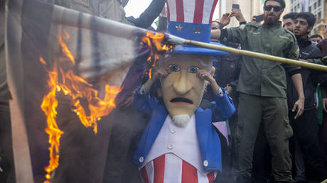 Iranians burn US and Israeli symbols to celebrate the National Day Against Global Arrogance