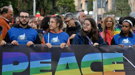 Members of the lay Catholic association Community of Sant’Egidio take part in a national peace demonstration on November 5, 2022, Rome, Italy