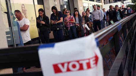 Voters wait to cast their ballots at the Biltmore Fashion Park on November 08, 2022 in Phoenix, Arizona.