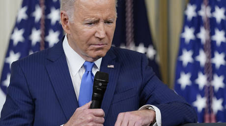 Joe Biden listens to a question from a reporter as he speaks at the White House in Washington, DC, November 9, 2022