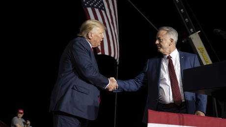 Joe Lombardo, candidate for governor of Nevada with former President Donald Trump at a rally at the Minden in Minden, Oct. 8, 2022