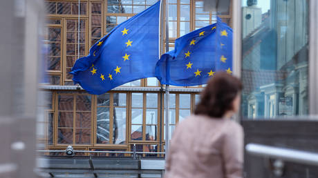 FILE PHOTO OF European Union flags flying outside the European Commission building in Brussels