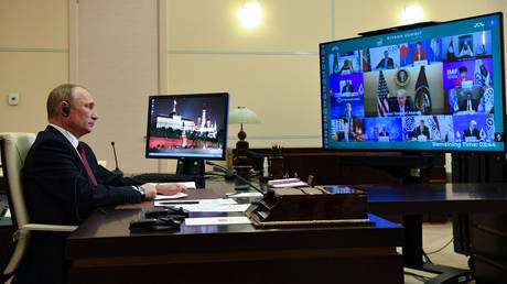 FILE PHOTO/ Russian President Vladimir Putin attends the G20 summit hosted by Saudi Arabia via video conference at the Novo-Ogaryovo state residence, outside Moscow, Russia, on November 21, 2020.