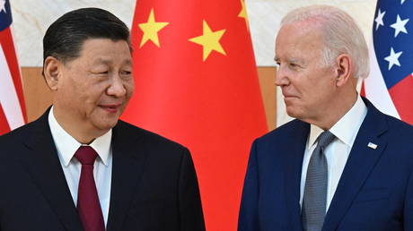 US President Joe Biden (R) and China's President Xi Jinping (L) meet on the sidelines of the G20 Summit in Nusa Dua on the Indonesian resort island of Bali on November 14, 2022.