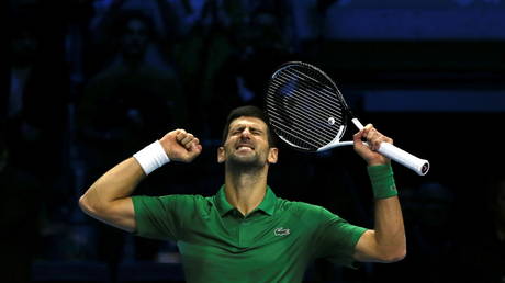 Novak Djokovic of Serbia celebrates after defeating Stefanos Tsitsipas of Greece during round robin play on Day Two of the Nitto ATP Finals