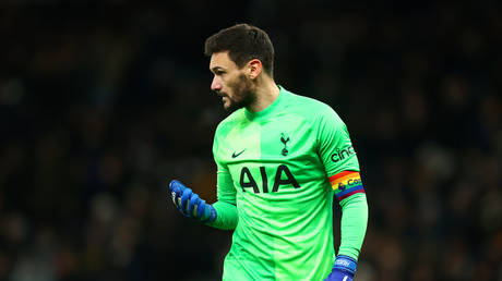 Hugo Lloris of Tottenham Hotspur gestures as he is seen wearing the Rainbow colored captains armband