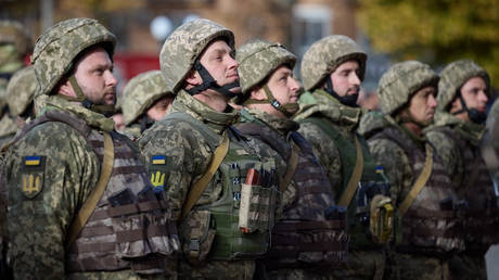 Ukrainian servicemen standing in attention.