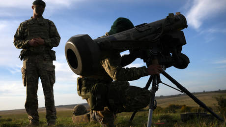 A Ukrainian recruit holds a Javelin anti-tank weapon during a five-week combat training course in the UK on October 11, 2022.