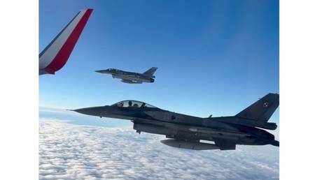 Poland team escorted by fighter jets on World Cup flight