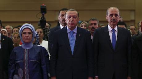 File photo: Numan Kurtulmus (R) with Turkish President Recep Tayyip Erdogan (C) at an event in Ankara, July 14, 2017.