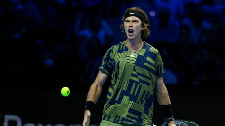 Rublev fights back to progress at ATP Finals