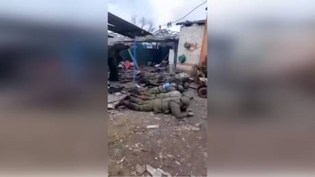 A screenshot from a video purportedly showing Russian soldiers surrendering to the Ukrainian forces.
