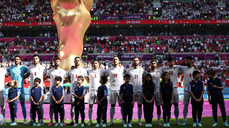 Iran players sang before beating Wales.