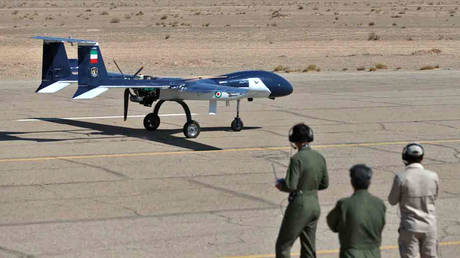 Iranian drone pilots operate a military unmanned aerial vehicle. AFP / Iran’s Defense Ministry