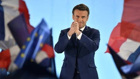 Emmanuel Macron addresses voters after leading the first round in the polls on April 10, 2022 in Paris, France.
