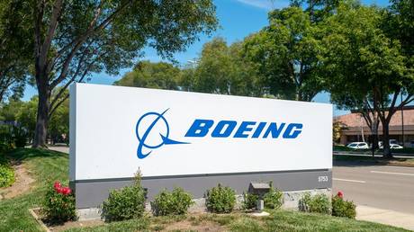 Sign with logo at entrance to office of aerospace company Boeing in Pleasanton, California