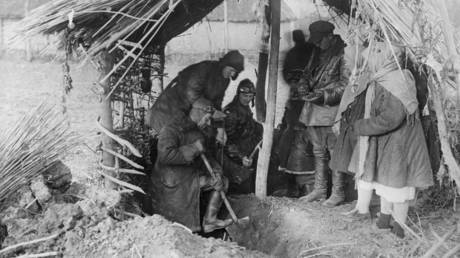 File photo: Soviet officials look for hidden grain in the Donetsk Region, Ukrainian SSR, during the 1933 famine.