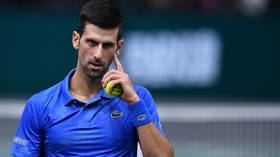 Djokovic downs Russian rival to move on in Paris