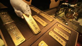 China secretly hoarding gold to ditch dollar – media