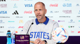 US coach apologizes after Iran flag scandal