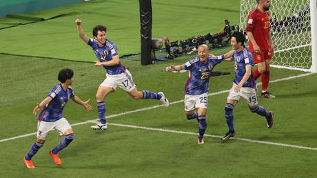 Japan booked passage to the knockout stages in Qatar.