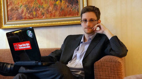 FILE PHOTO: Former intelligence contractor Edward Snowden poses for a photo during an interview in an undisclosed location in Moscow, Russia.