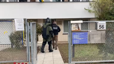 An explosives technician enters the Ukrainian consulate in Brno, Czech Republic, December 2, 2022