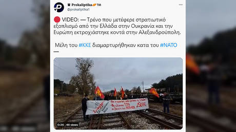 Protesters rally near derailed train with NATO hardware