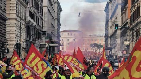Members of the USB trade union march in Rome, Italy, December 3, 2022