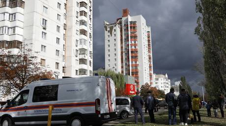 FILE PHOTO: Special services outside a residential building damaged by Ukrainian shelling in Belgorod, Russia, October 13, 2022