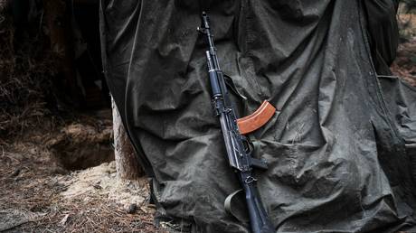 FILE PHOTO. AK rifle near a shelter in the Kherson region