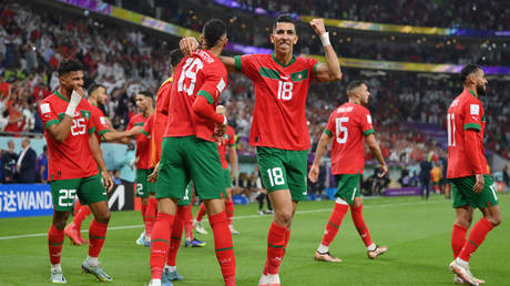Youssef En-Nesyri celebrates after scoring the team's first goal during the FIFA World Cup Qatar 2022 quarter final