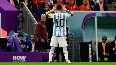 Lionel Messi celebrates after scoring the team's second goal during the World Cup Quarter Final match between Netherlands and Argentina