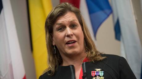 Chris Beck, who then identified as a woman, speaks during a conference on transgender issues in the military in Washington, DC, October 20, 2014