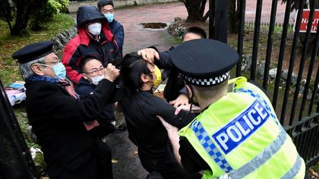 China pulls diplomats after riot – UK