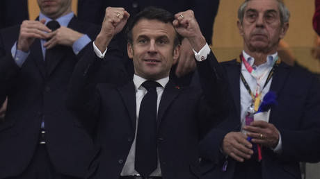 French president Emmanuel Macron gestures during the World Cup semifinal soccer match between France and Morocco at the Al Bayt Stadium in Al Khor, Qatar, Dec. 14, 2022.