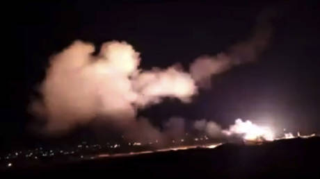 FILE PHOTO: Missiles flying into the sky near Damascus, Syria