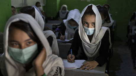File photo: Female students in 10th grade class at the Zarghoona high school in Kabul, Afghanistan, July 25 2021.