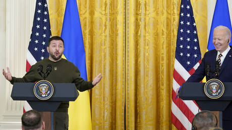 Ukrainian President Vladimir Zelensky speaks during a news conference with President Joe Biden in the East Room of the White House in Washington, December 21, 2022