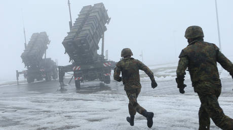 FILE PHOTO. Two Patriot missile launchers in Germany.