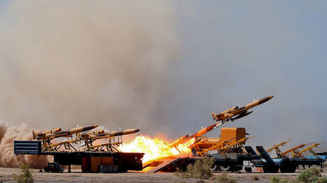 The launch of a military unmanned aerial vehicle during a two-day drone drill at an undisclosed location in Iran