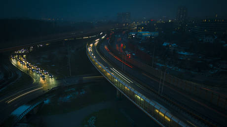 Evening traffic is seen in Warsaw, Poland on 25 November, 2022.