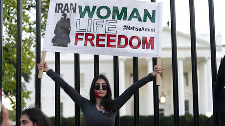 Demonstrators rally outside the White House to protest against the Iranian regime, in Washington, Saturday, Oct. 22, 2022, following the death of Mahsa Amini in the custody of the Islamic republic's notorious "morality police."