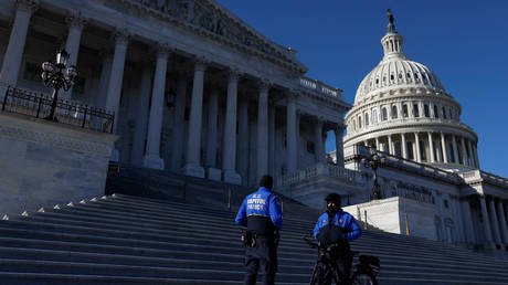 US Capitol Police officers stand outside the House Chambers on December 23, 2022.