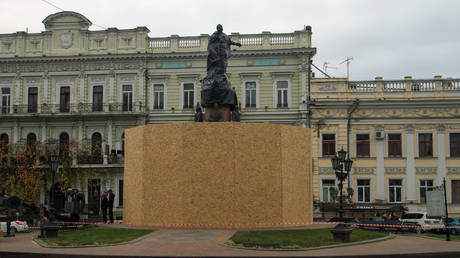 A monument to Catherine II is seen in protective structures and wrapped with a film in preparation for its dismantling at Ekaterinskaya Square.
