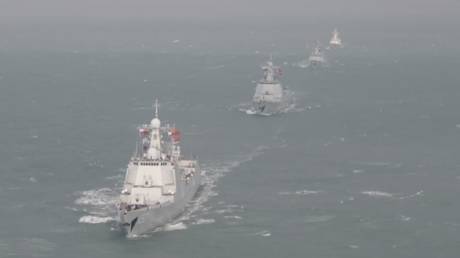 Russian and Chinese warships are seen during the ‘Maritime Interaction 2022’ exercises in the East China Sea, held between December 21 and 27, 2022.