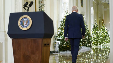 President Joe Biden leaves after speaking in the East Room of the White House ahead of the holidays, Thursday, Dec. 22, 2022, in Washington.